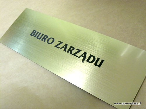 Tabliczka na drzwi grawerowana nr 52 Tabliczka grawerowana z laminatu  metalizowanego - zoty szlifowany LZ 990